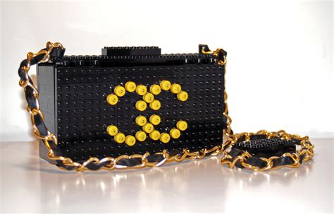 black and white chanel lego clutch|Chanel pink Lego bag.